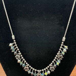 Brighton necklace, blue beads with charms